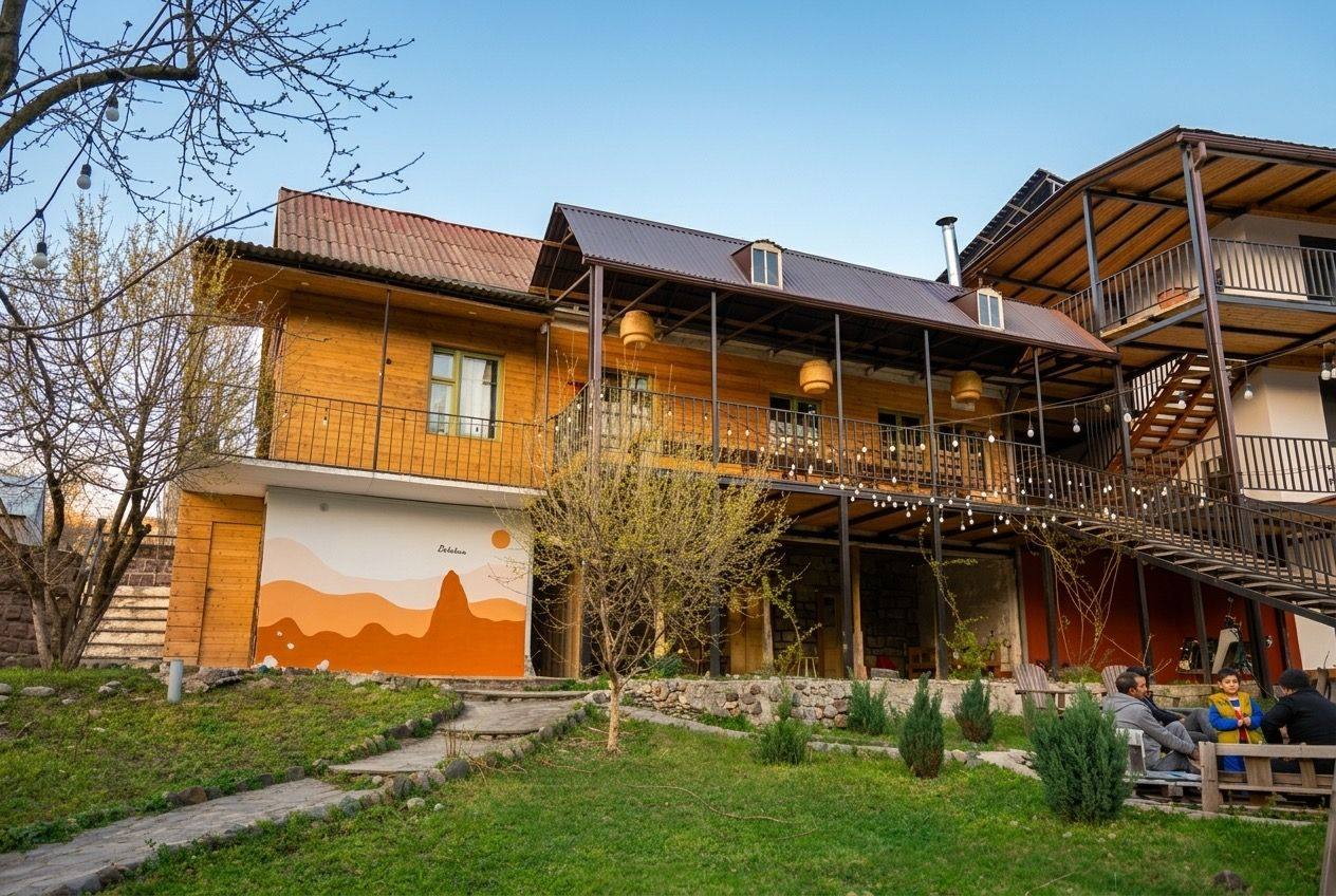 The Debatoun guesthouse in Lori, with wooden balconies and a garden